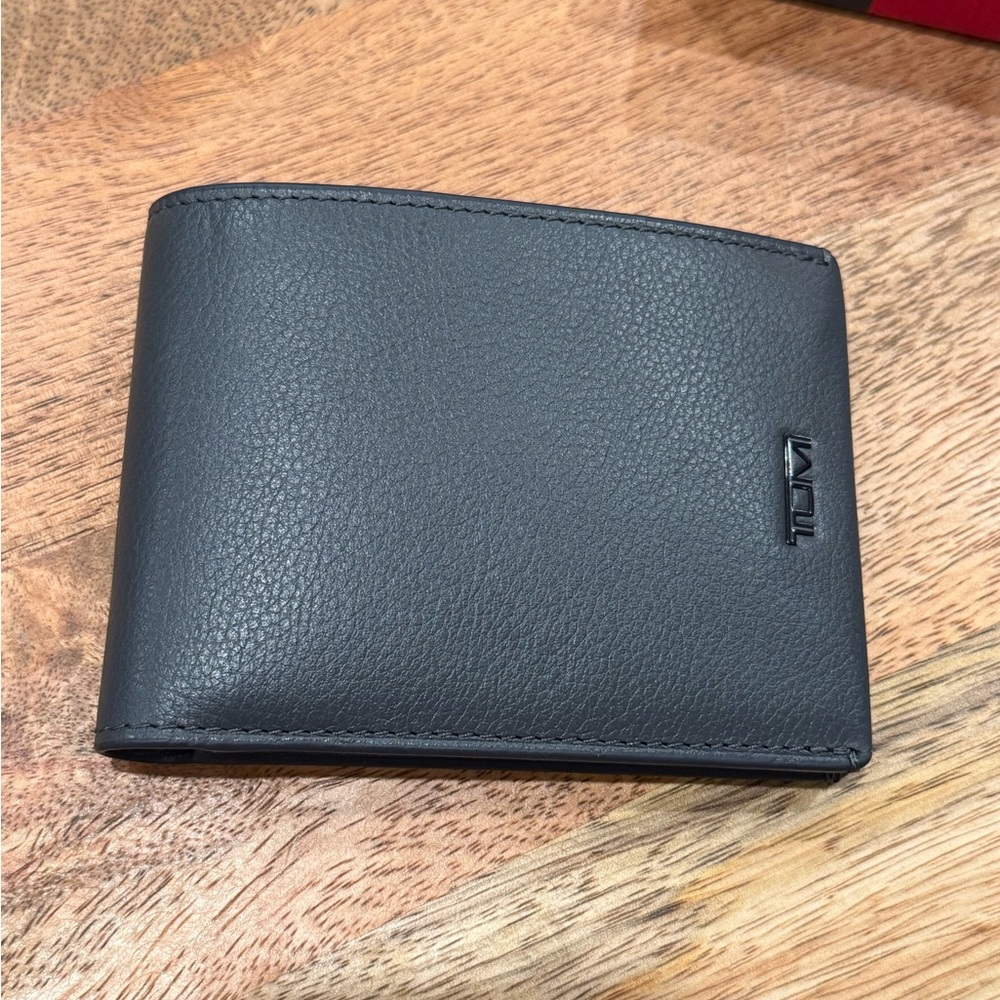 New in Box Tumi Charcoal Leather Wallet